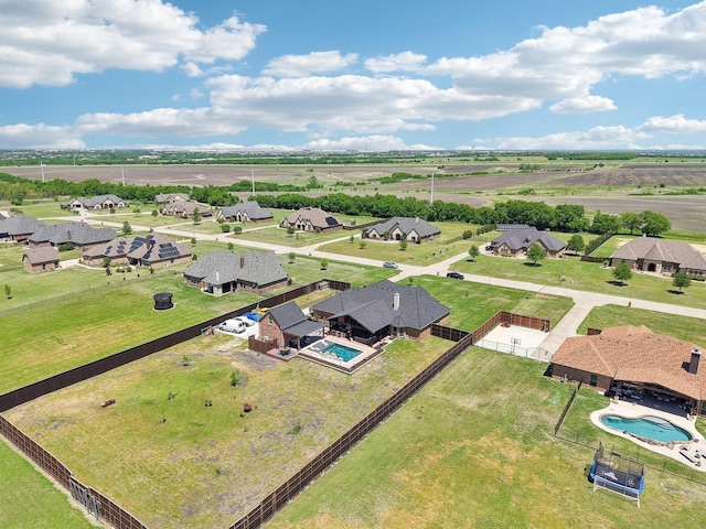 birds eye view of property with a residential view