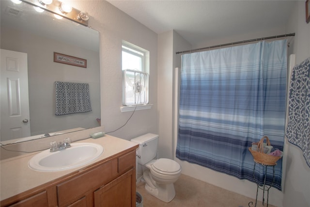 bathroom with shower / tub combo, visible vents, vanity, and toilet