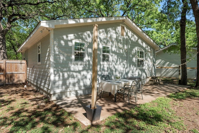 111 Peaceful Ln, Lacy Lakeview, TX 76705 - back of property featuring fence and a patio