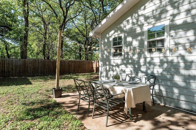111 Peaceful Ln, Lacy Lakeview, TX 76705 - view of patio featuring fence and outdoor dining space