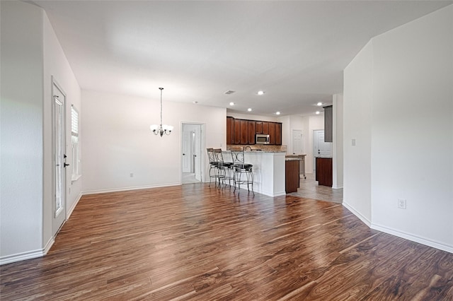 351 Peachtree Ln, Princeton, TX 75407 - bathroom with toilet, a textured wall, bath / shower combo with glass door, and vanity