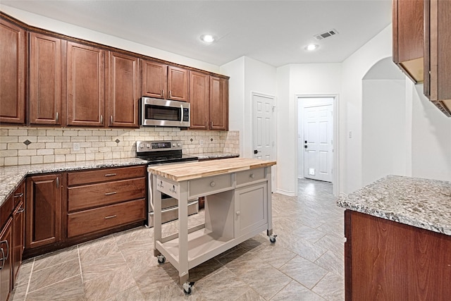 351 Peachtree Ln, Princeton, TX 75407 - unfurnished bedroom featuring baseboards, visible vents, and carpet flooring