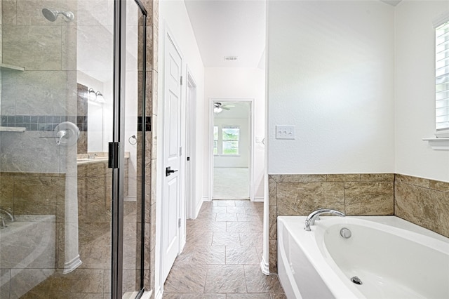 351 Peachtree Ln, Princeton, TX 75407 - bathroom featuring a garden tub, visible vents, and a shower stall