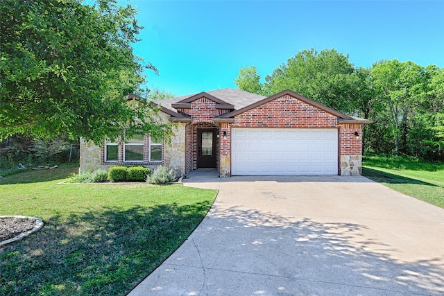 351 Peachtree Ln, Princeton, TX 75407 - ranch-style home with a front lawn, driveway, stone siding, and a garage