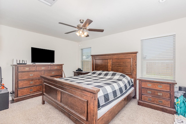 1607 Grand Villa St, Princeton, TX 75407 - bedroom with visible vents, a ceiling fan, and light colored carpet