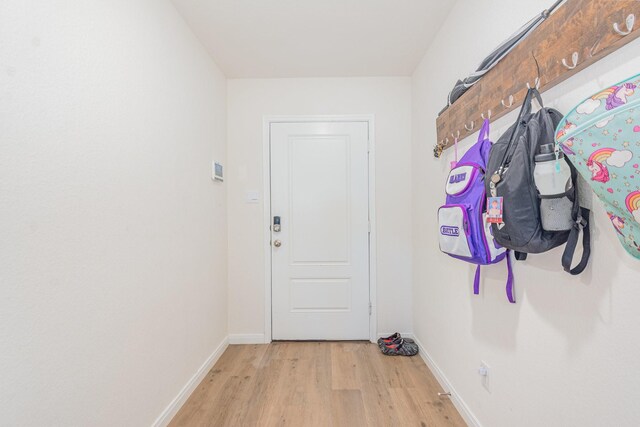 1607 Grand Villa St, Princeton, TX 75407 - entryway featuring baseboards and wood finished floors