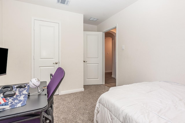 1607 Grand Villa St, Princeton, TX 75407 - carpeted bedroom featuring visible vents, baseboards, and arched walkways