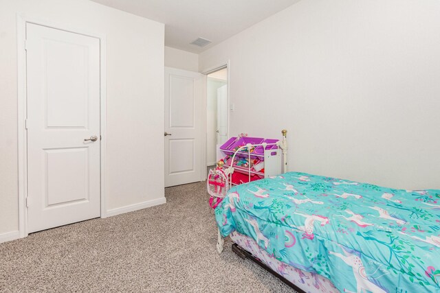 1607 Grand Villa St, Princeton, TX 75407 - carpeted bedroom featuring baseboards and visible vents