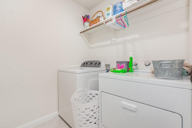 1607 Grand Villa St, Princeton, TX 75407 - laundry room featuring baseboards, separate washer and dryer, and laundry area