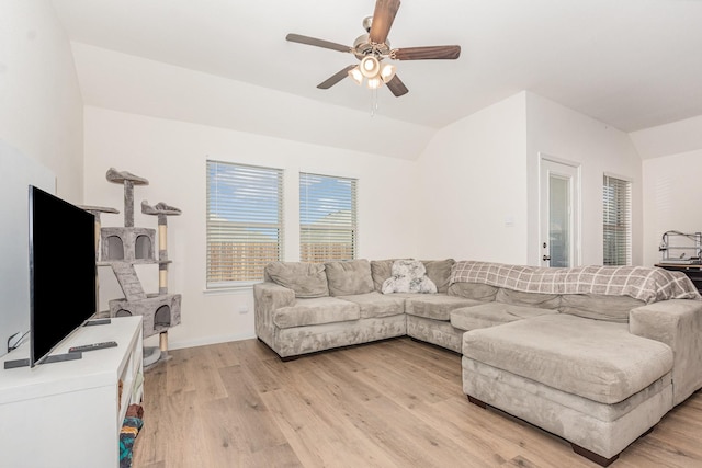 1607 Grand Villa St, Princeton, TX 75407 - living room with light wood finished floors, a ceiling fan, baseboards, and vaulted ceiling