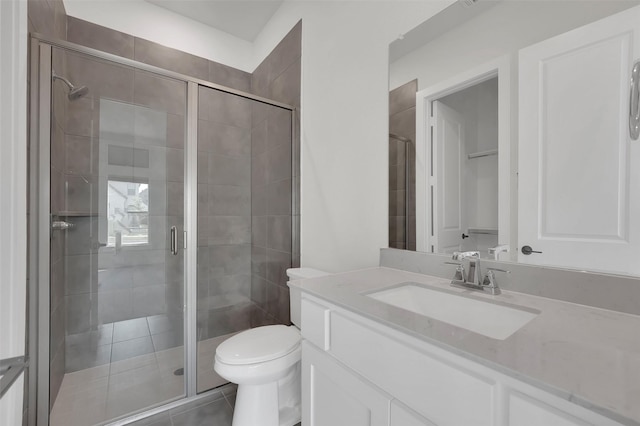 4330 Silver Spur Dr, Prosper, TX 75078 - full bath featuring a stall shower, toilet, vanity, and tile patterned flooring