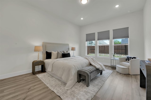 4330 Silver Spur Dr, Prosper, TX 75078 - bedroom featuring light wood finished floors, baseboards, and recessed lighting