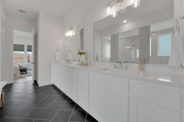 4330 Silver Spur Dr, Prosper, TX 75078 - full bath featuring walk in shower, double vanity, ensuite bathroom, and baseboards