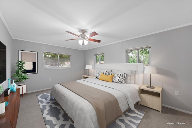 bedroom with baseboards, a ceiling fan, carpet flooring, and ornamental molding