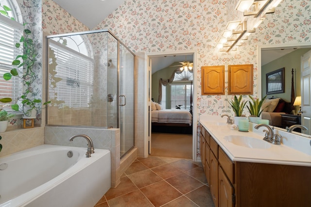 bathroom with wallpapered walls, a shower stall, connected bathroom, a sink, and a garden tub