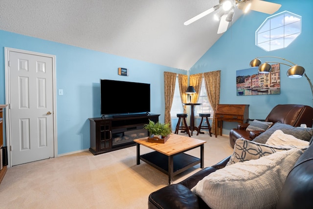 living room featuring high vaulted ceiling, ceiling fan, carpet floors, and baseboards
