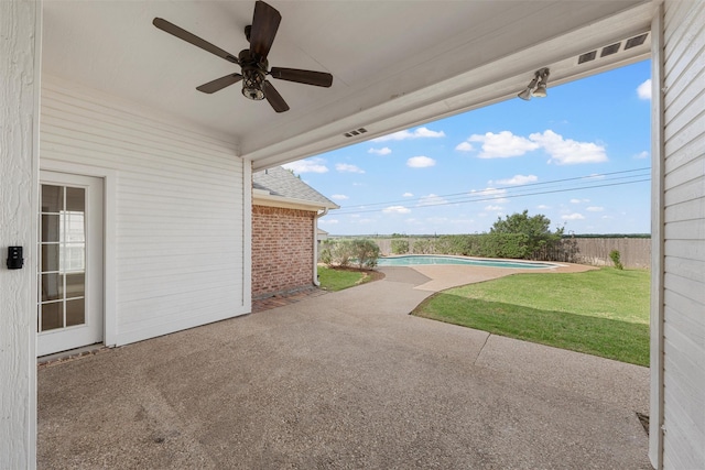 view of patio with ceiling fan, a fenced backyard, a fenced in pool, and visible vents