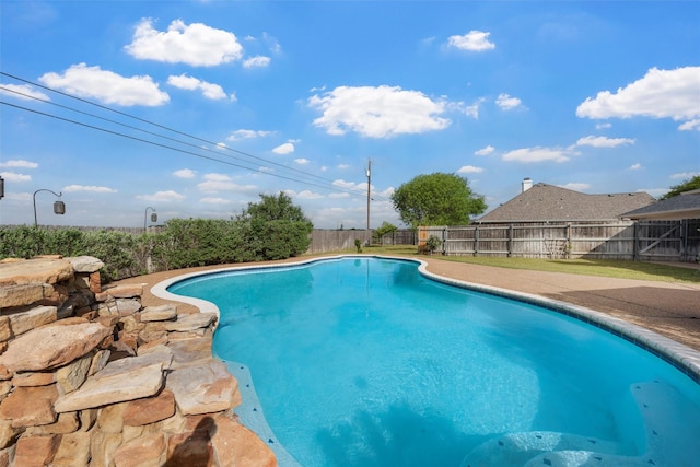 view of pool featuring a fenced backyard and a fenced in pool