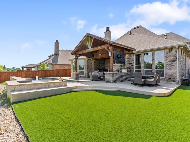 2908 Ballater Ct, The Colony, TX 75056 - rear view of property featuring a patio, brick siding, a shingled roof, and a chimney