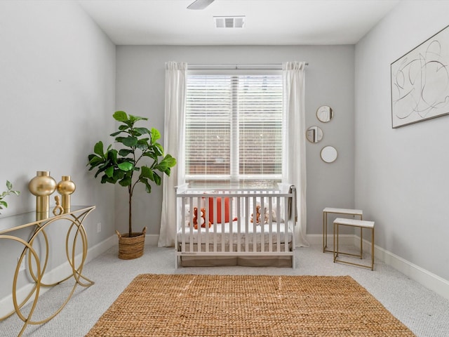 2908 Ballater Ct, The Colony, TX 75056 - carpeted bedroom featuring a crib and baseboards