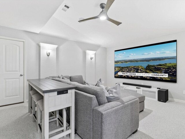 laundry area featuring light tile patterned floors, baseboards, washing machine and dryer, and visible vents