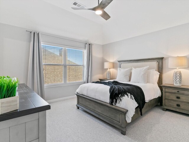 home office with arched walkways, baseboards, and light carpet