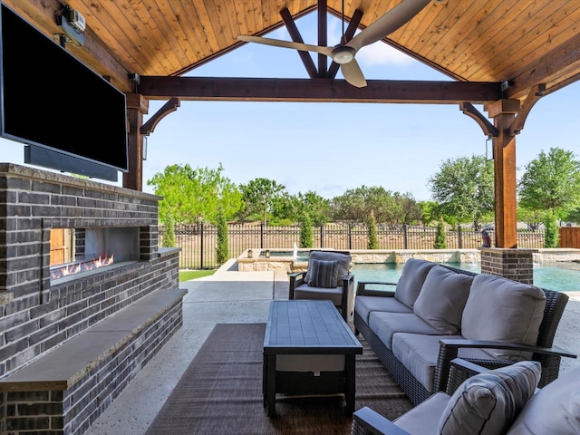2908 Ballater Ct, The Colony, TX 75056 - fenced backyard with a gazebo, an outdoor living space with a fireplace, a pool with connected hot tub, a patio, and ceiling fan