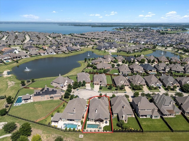 2908 Ballater Ct, The Colony, TX 75056 - aerial view of residential area featuring property boundaries highlighted and a nearby body of water
