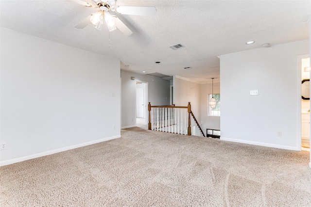 unfurnished room with ceiling fan, visible vents, baseboards, carpet, and recessed lighting
