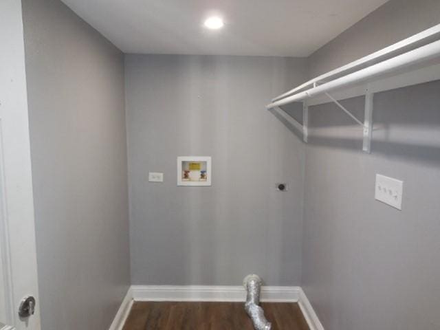 laundry area with electric dryer hookup, baseboards, dark wood-type flooring, laundry area, and washer hookup