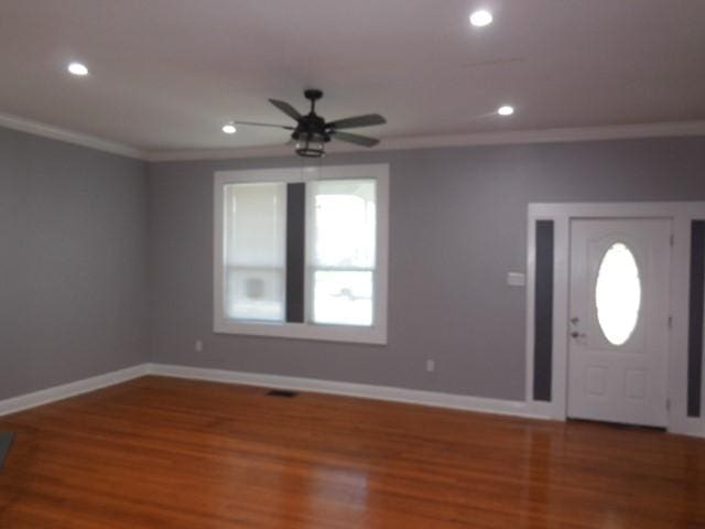 foyer featuring recessed lighting, ceiling fan, wood finished floors, and ornamental molding