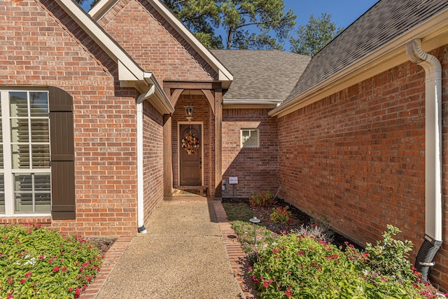 789 Fairmont Dr, Tyler, TX 75701 - property entrance featuring brick siding and roof with shingles
