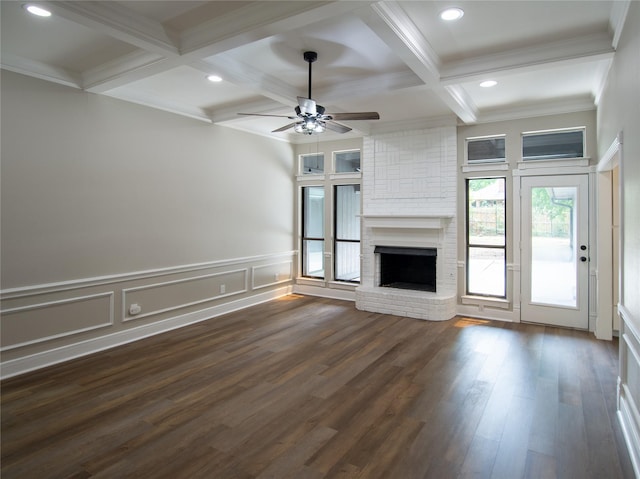 unfurnished living room featuring beam ceiling, recessed lighting, coffered ceiling, ceiling fan, and a fireplace