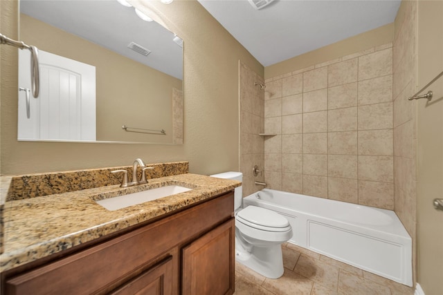 bathroom with toilet, vanity, shower / bath combination, and visible vents