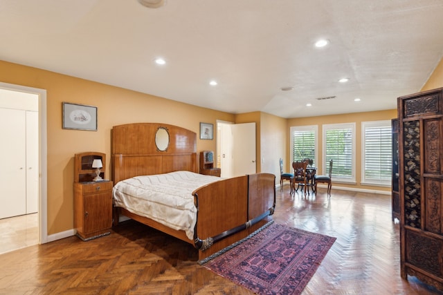 bedroom featuring recessed lighting, visible vents, and baseboards