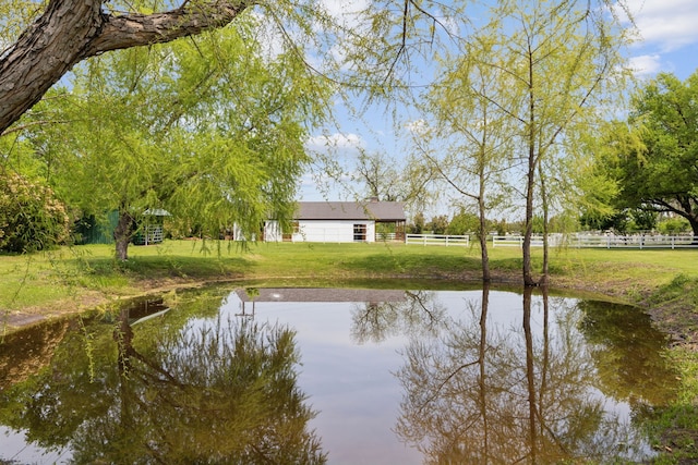 view of water feature featuring fence