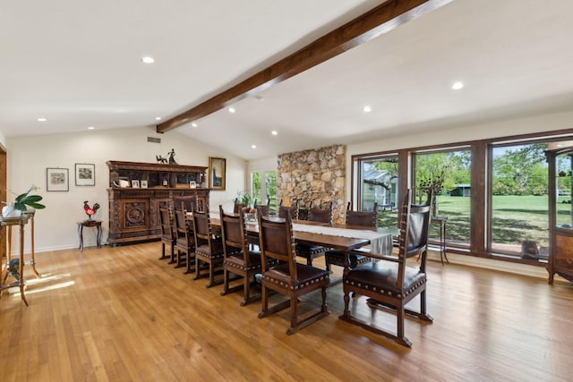 dining space featuring recessed lighting, light wood finished floors, visible vents, and vaulted ceiling with beams