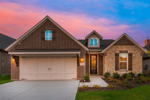15044 Ted Trl, Aledo, TX 76008 - view of front of home featuring concrete driveway, brick siding, and stone siding