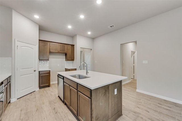 15044 Ted Trl, Aledo, TX 76008 - kitchen featuring a sink, stainless steel dishwasher, light wood finished floors, an island with sink, and recessed lighting