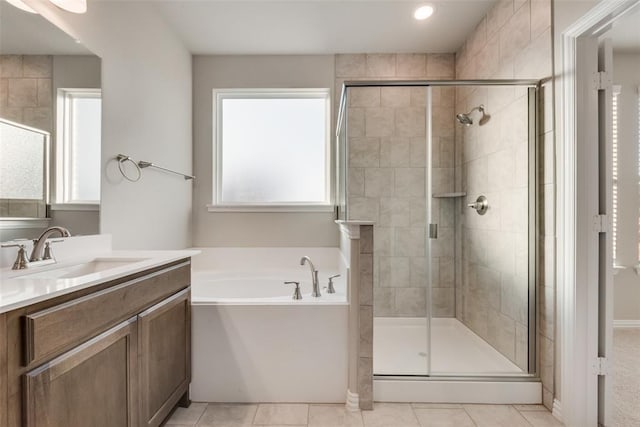 15044 Ted Trl, Aledo, TX 76008 - bathroom featuring a shower stall, a garden tub, vanity, and tile patterned flooring