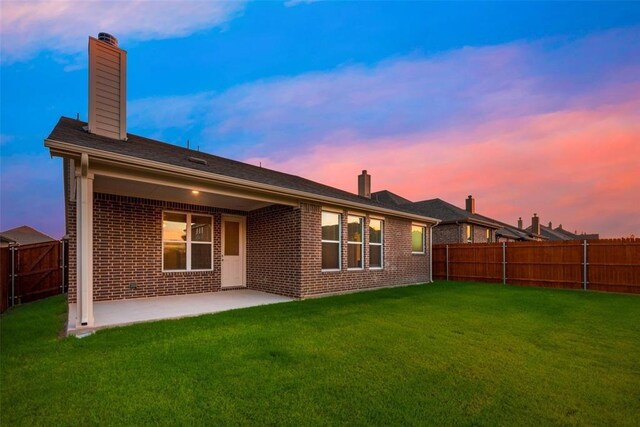 15044 Ted Trl, Aledo, TX 76008 - back of house featuring a patio, a chimney, and brick siding