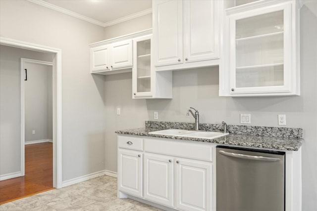 kitchen with stainless steel dishwasher, ornamental molding, light stone countertops, and a sink