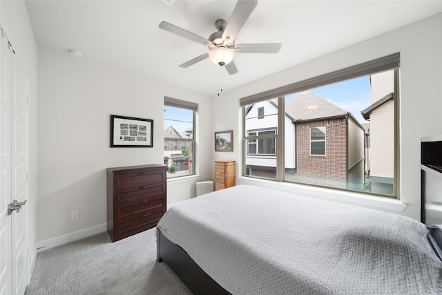 7112 Amber Grove Ct, Dallas, TX 75231 - bedroom with baseboards, ceiling fan, and carpet floors