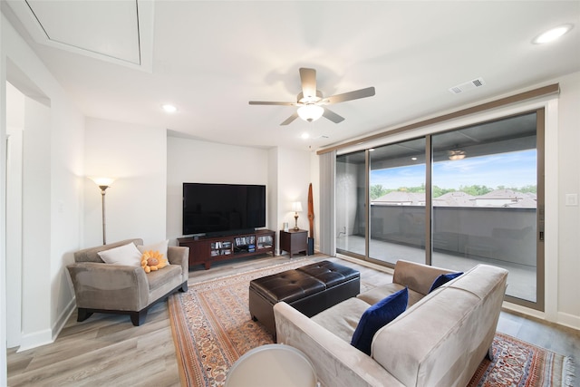 7112 Amber Grove Ct, Dallas, TX 75231 - living area featuring a ceiling fan, light wood-type flooring, visible vents, and recessed lighting