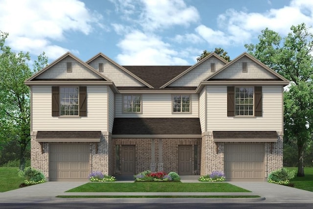 craftsman-style home with brick siding, an attached garage, a shingled roof, and driveway