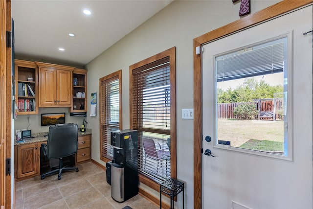 home office with recessed lighting, built in study area, baseboards, and light tile patterned floors