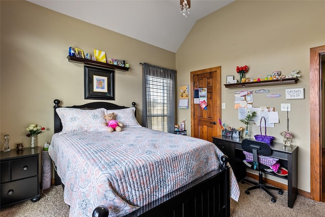 bedroom featuring carpet floors, lofted ceiling, and baseboards