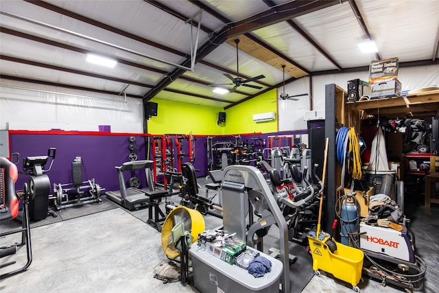garage featuring a wall mounted air conditioner and a ceiling fan
