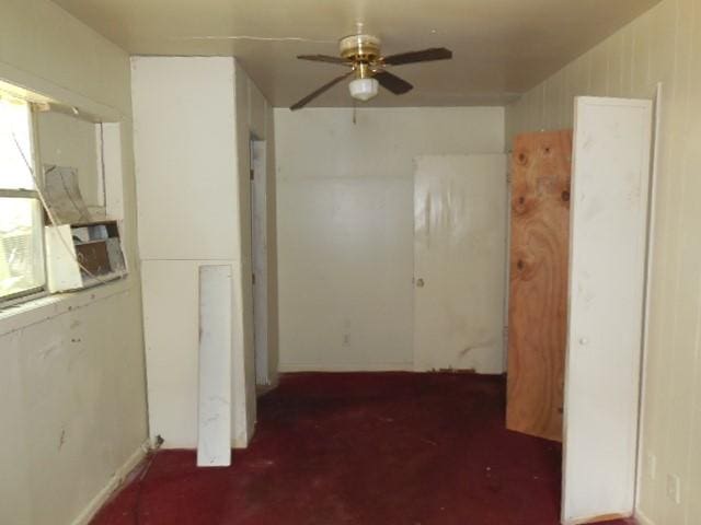 corridor featuring carpet flooring