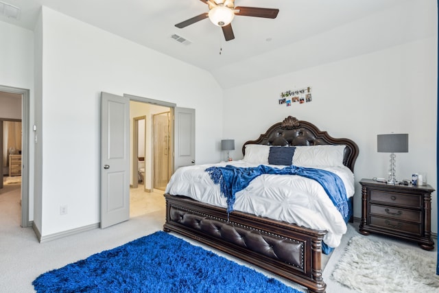 bedroom featuring lofted ceiling, baseboards, visible vents, and carpet flooring